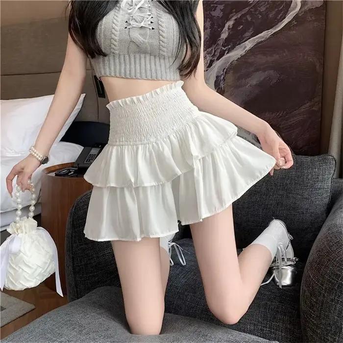 Printemps gâteau jupes plissées pour les femmes blanc nouvelle jupe courte été coréen à volants taille élastique