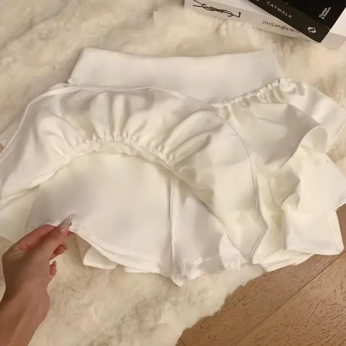 Mini-jupe à volants superposés taille haute avec short intégré pour femme et adolescente