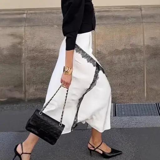 Jupe mi-longue en Satin avec bordure en dentelle