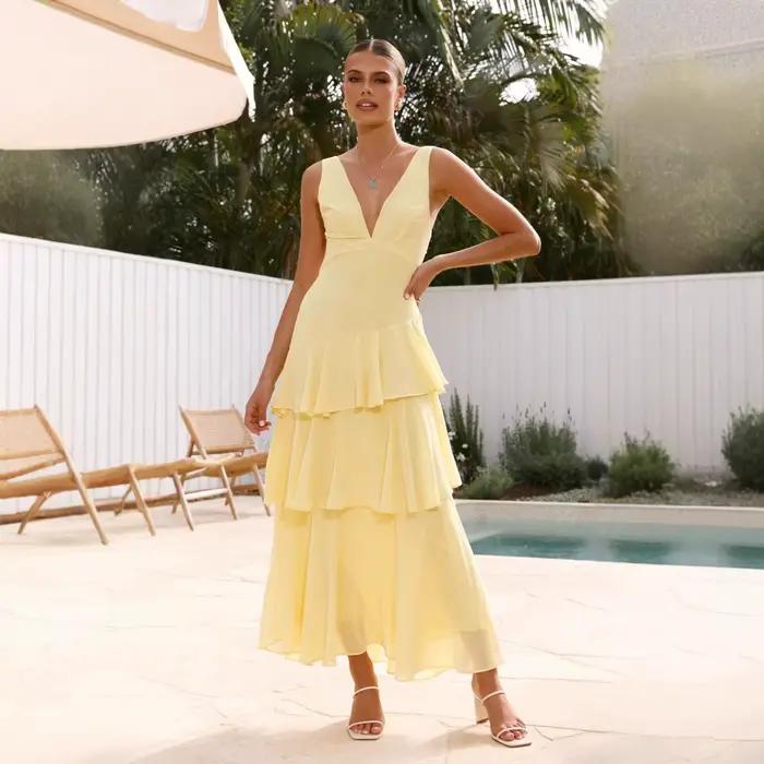 Robe longue à col en V, couleur unie, avec ceinture, style vacances d'été, jupe à volants, en polyester, sans manches, taille mi-haute, fraîche et élégante