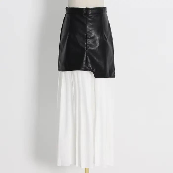 Nouvelle jupe plissée color-block avec inserts en cuir pour femme