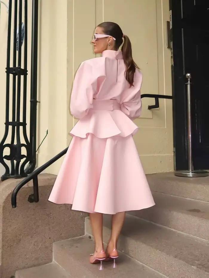 Jupe mi-longue plissée rose en tissu polyester de haute qualité