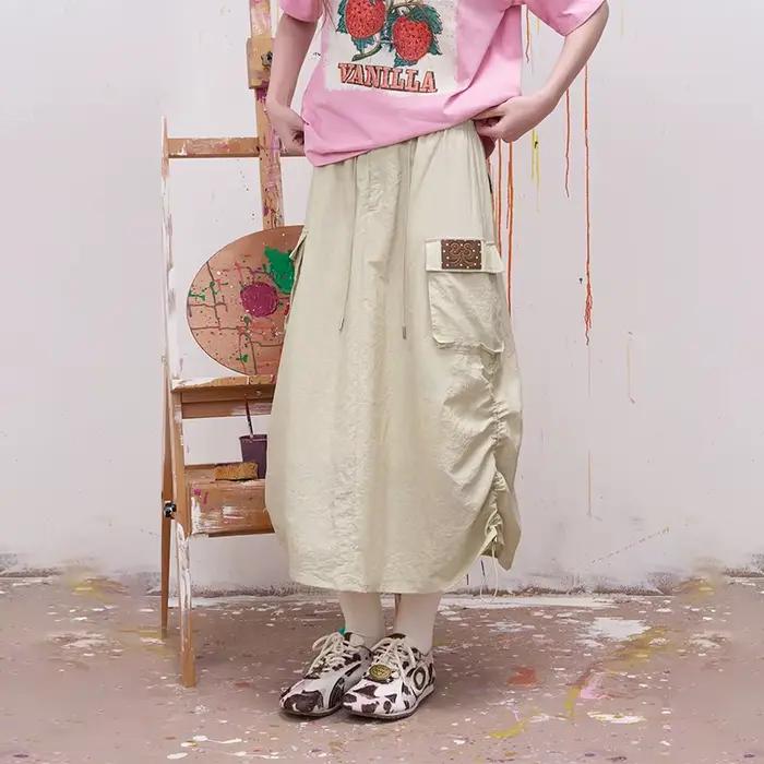 ELFSACK Jupe cargo mi-longue streetwear avec détails patchwork pour femme, jupe d'été Kawaii avec taille à cordon, tenue cool style Harajuku