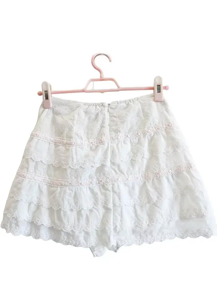 Jupes blanches pour filles adorables, décorées de fleurs brodées, avec un nœud, taille élastique, jupes courtes en coton à plusieurs couches, mignonnes, pour femmes