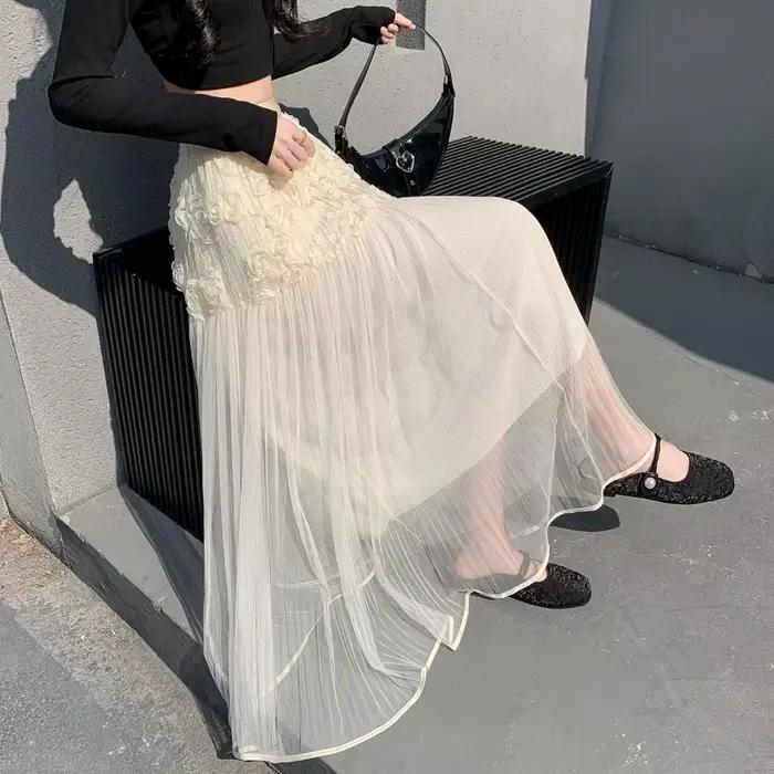Jupe mi-longue à volants en abricot Printemps-Été 2026, Jupes élégantes et douces en maille florale pour femmes, Jupe trapèze transparente à taille haute tendance