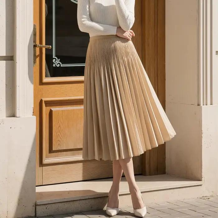 Jupe plissée polyvalente de cette saison pour les trajets quotidiens des femmes