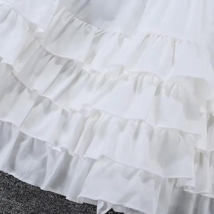 Jupe bouffante blanche en mousseline de soie à volants