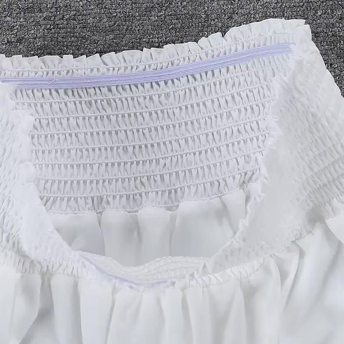Jupe bouffante blanche en mousseline de soie à volants