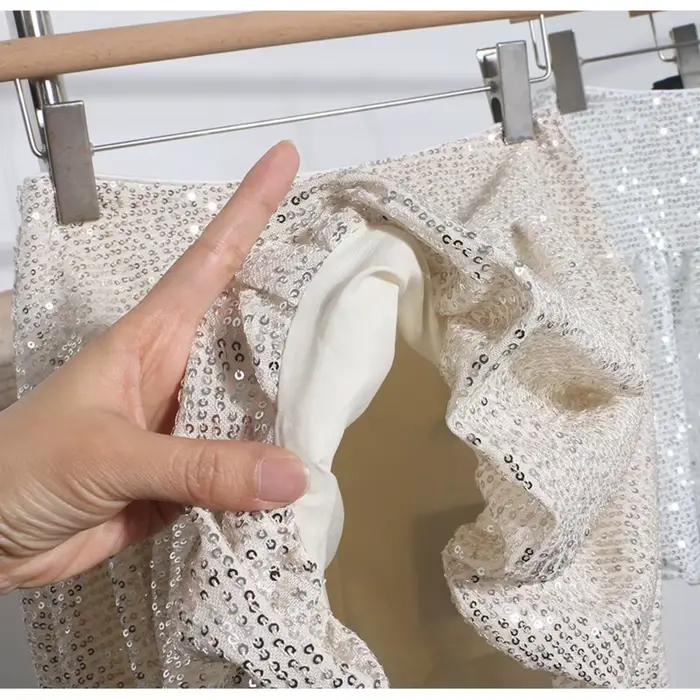 Nouvelle jupe courte trapèze à sequins pour femme, été 2026, sexy, élégante et amincissante