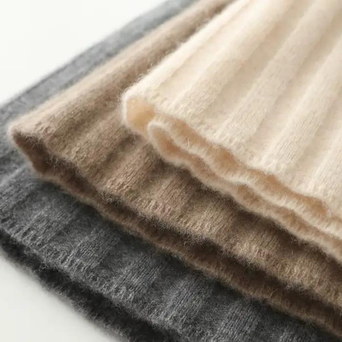 Jupe mini coréenne en laine mérinos pour femme, couleur unie, mode automne hiver, tour de taille empire, tricotée, légèrement extensible, style bureau dame, disponible en plusieurs tailles et couleurs