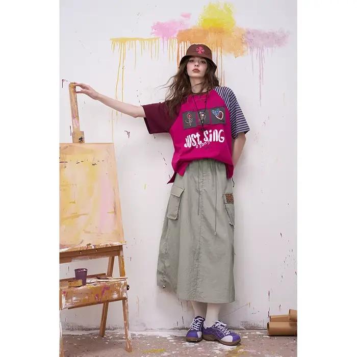 ELFSACK Jupe cargo mi-longue streetwear avec détails patchwork pour femme, jupe d'été Kawaii avec taille à cordon, tenue cool style Harajuku