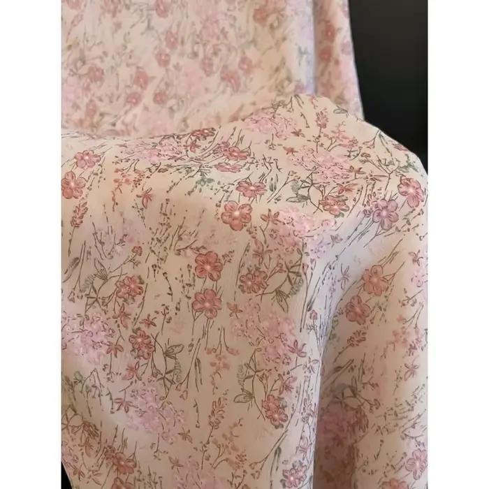 Jupe mi-longue rose à imprimé floral pour femme