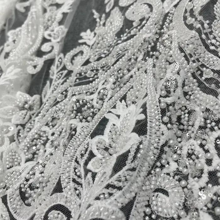 Robe de mariée haut de gamme unique et luxueuse de style palais, broderie en dentelle perlée, tissu brodé