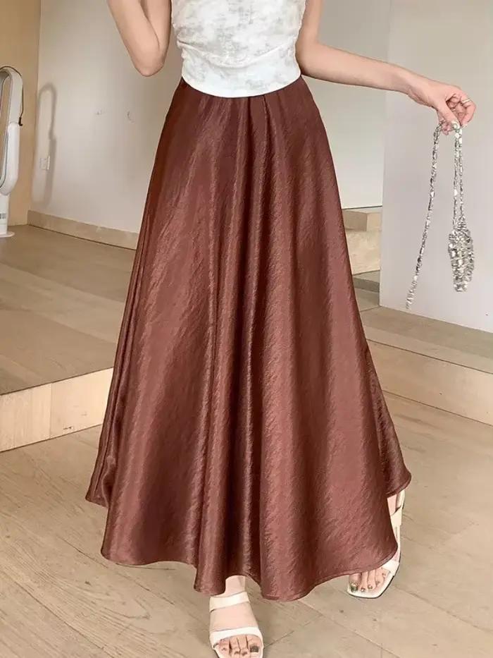 Zjaiss femme Satin demi-corps jupe 2026 printemps nouvelle mode coréenne tempérament élégant solide décontracté a-ligne jupes