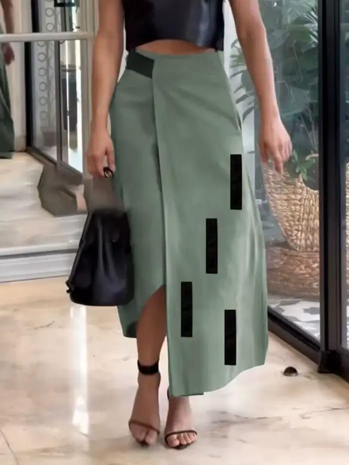 UOOZEE femmes mode asymétrique a-ligne jupes 2025 nouveautés poches à articulations fendues ample élastique taille haute jupe bas