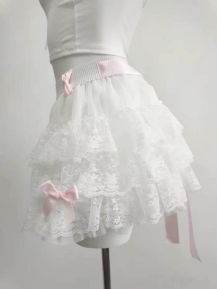 Jupes en dentelle multicouches pour filles douces, rubans d'été, nœuds décoratifs, taille élastique, style Lolita, jupe blanche, vêtements Kawaii