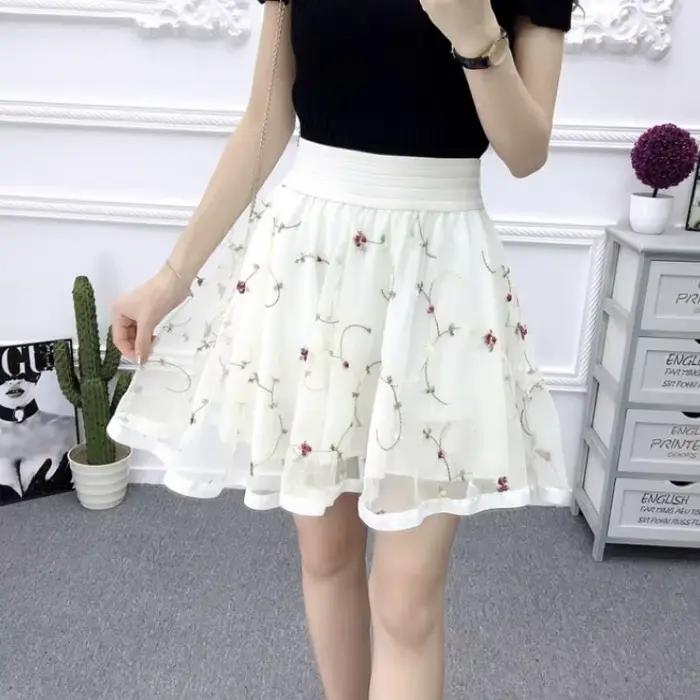 Mini jupe trapèze plissée en tulle élastique pour femme