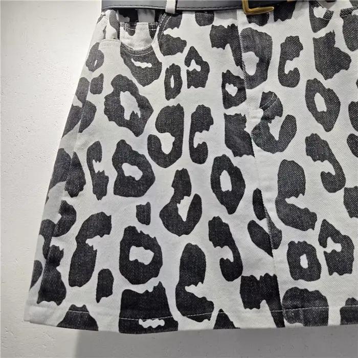 Jupe courte en jean imprimé léopard pour femmes, style décontracté américain, rétro, taille haute, coupe trapèze, mini-jupe