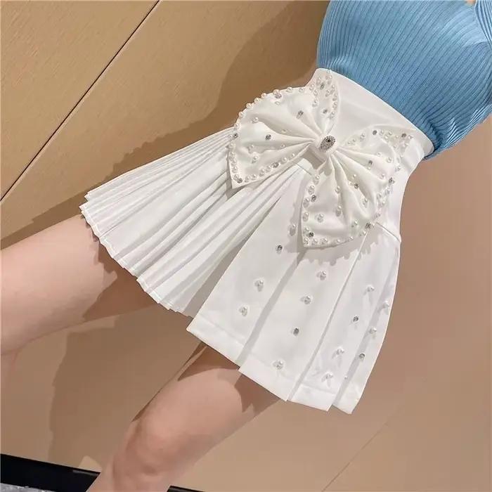 Jupe plissée à nœud perlé style diamant français