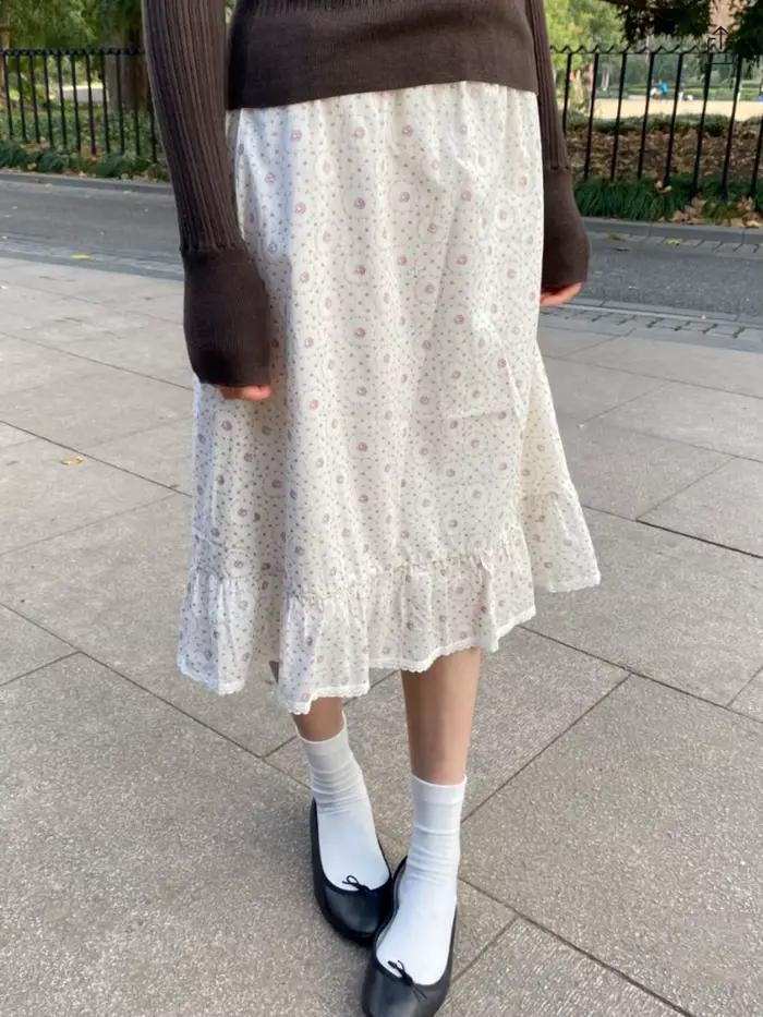 Nouvelle jupe midi florale violette pour femme