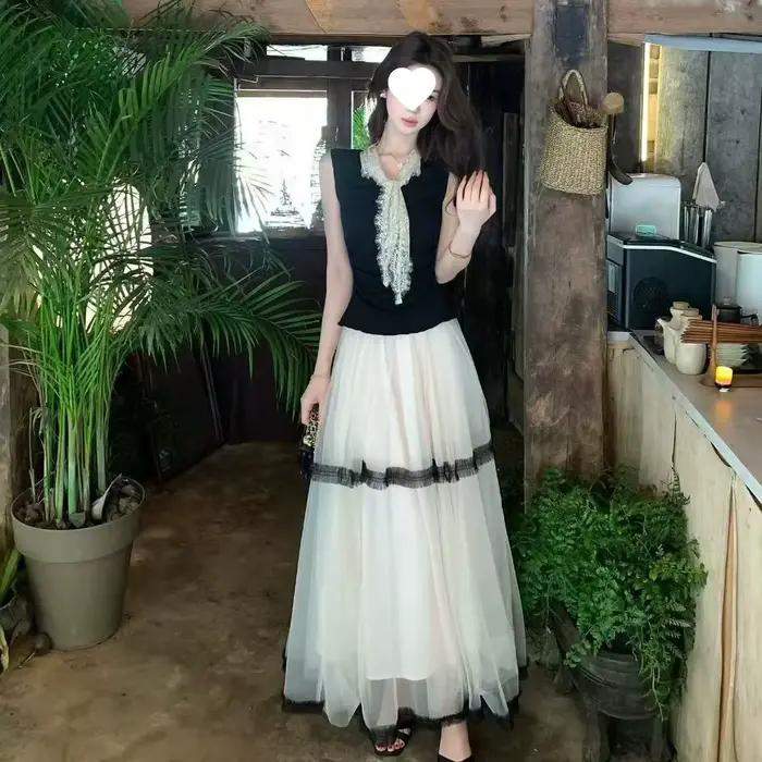 Ensemble élégant jupe longue en maille noire et haut sans manches – Tendance estivale