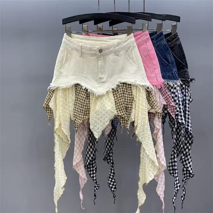Mode irrégulière Plaid Patchwork Denim jupes pour les femmes enveloppé hanche Niche conception Mini jupe femme à la mode nouveau