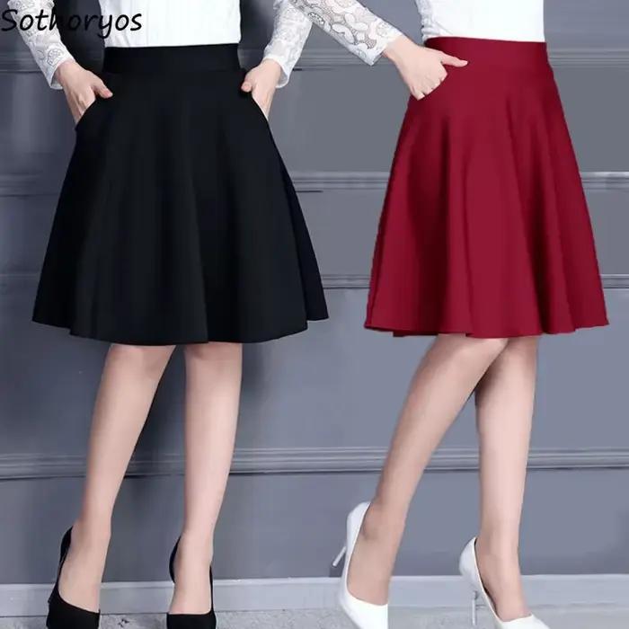 Jupes femmes populaire M-3XL plissé solide poche taille élastique jupe moyenne à la mode tout-match bureau dame respectueux de la peau élégant