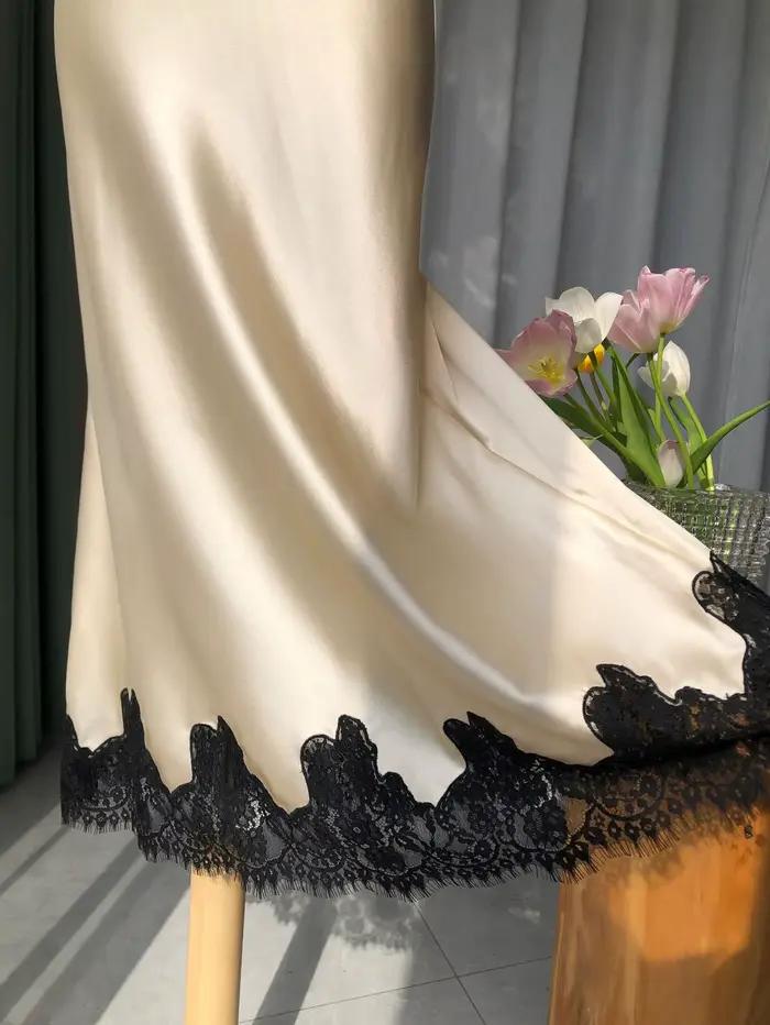 Jupe longue élégante en soie avec dentelle florale creuse noire et blanche