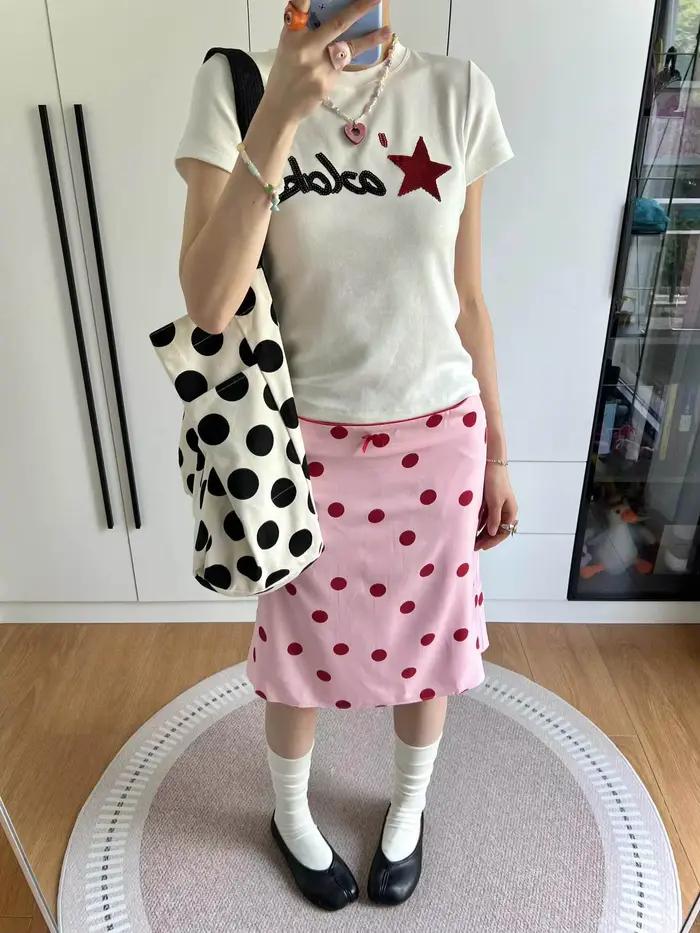 Jupe mi-longue tube droite à pois rose style rétro américain pour femme