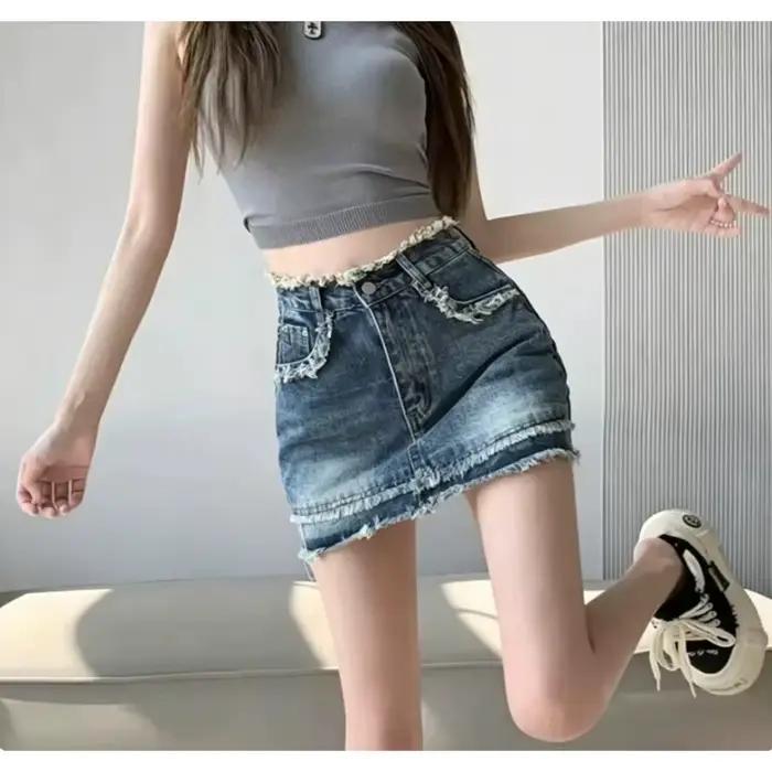 Jupe courte en jean vintage taille haute à ourlet effiloché pour femme