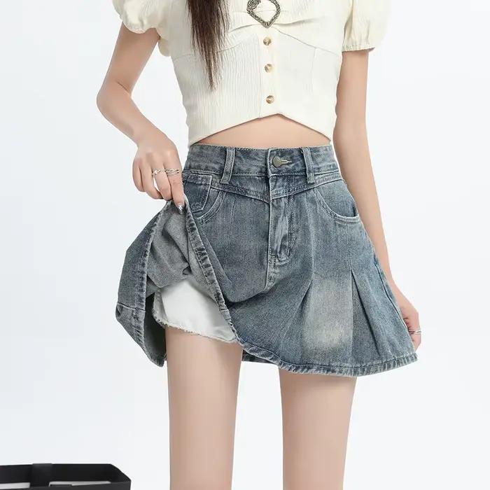 Jupe courte plissée en jean bleu taille haute pour femme