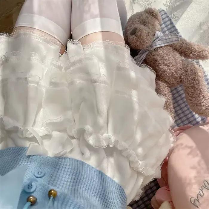 Nouveau rose japonais Kawaii Lolita jupe femmes nœud laine chaud doux Mini gâteau