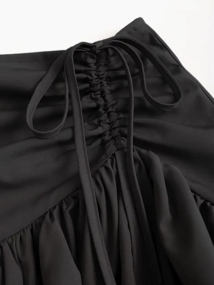 Jupe midi asymétrique noire à volants multicouches