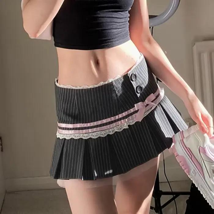 Jupe plissée en tissu de costume de ballet à rayures contrastées avec nœud et dentelle