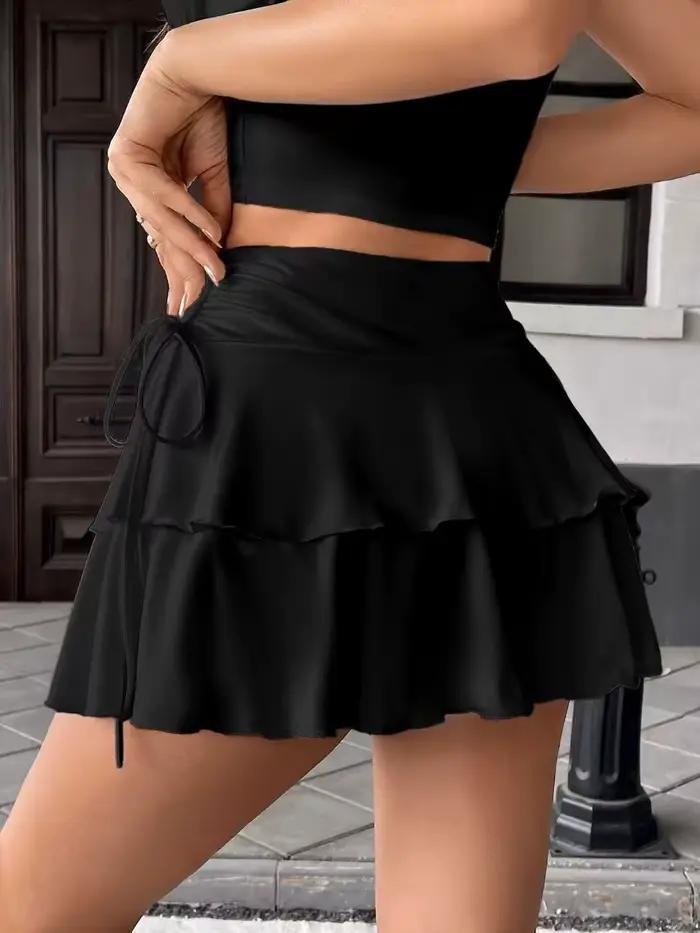 Jupe mini évasée unie à taille haute avec cordon de serrage et détail plissé, idéale pour les tenues de fête, de plage et de vacances d'été