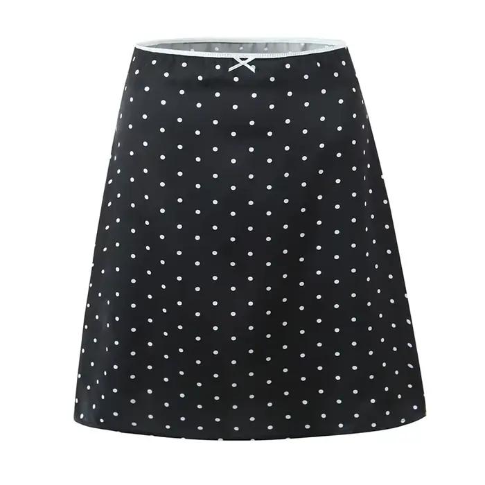 YENKYE-Jupe trapèze à pois pour femme, longueur genou, vintage, noir, blanc, sexy, taille basse, vacances, été, 2025