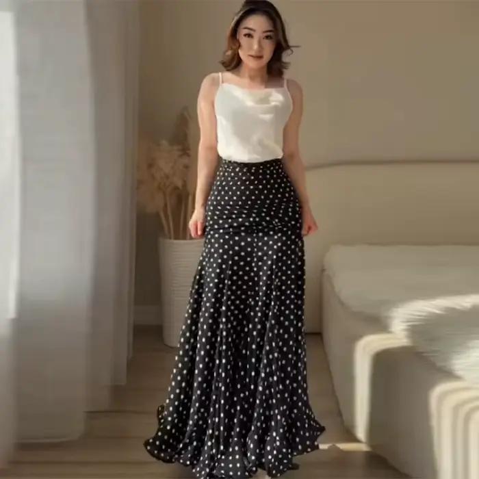 Jupe longue élégante à pois en mousseline, silhouette sirène, coupe taille haute, ourlet fluide à volants, idéale pour les femmes et les occasions formelles printemps été