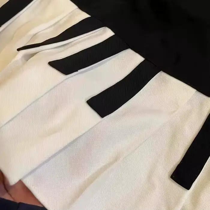 Jupe courte épissée noire et blanche pour femmes, design slim, Harajuku chic, jupe de piano rétro plissée, midi, kawaii, 2025 y2k polyester plissé avec appliques pour bureau et occasions sociales