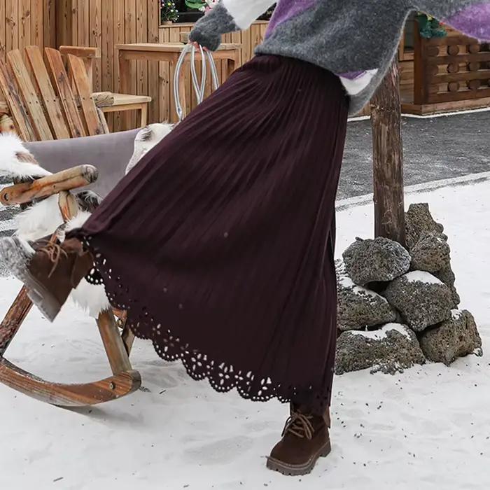 Femmes solide Vintage jupe plissée fleur creuse a-ligne Medi longue Maxi