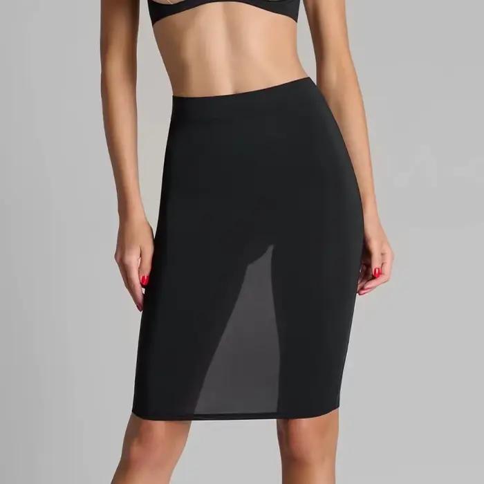 Nouvelle jupe moulante noire avec design sexy révélant les fesses pour l'été 2026
