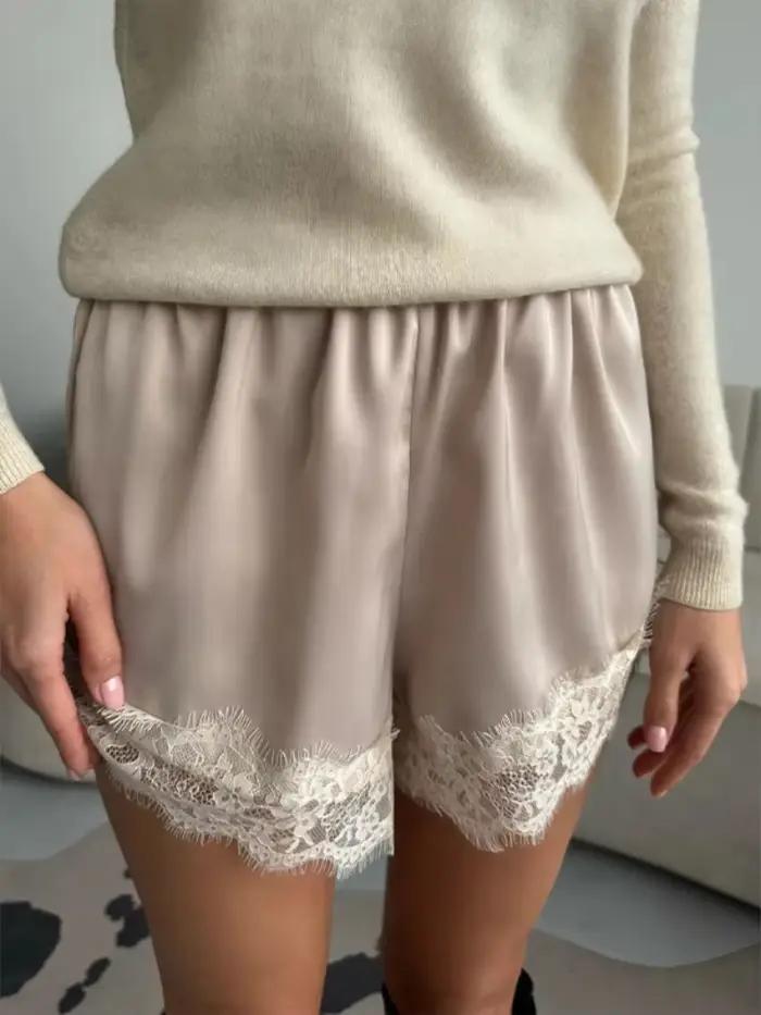 Femmes asymétrique dentelle garniture solide blanc Mini jupe à volants 2025 été mode doux Satin femme jupes vacances plage dame article