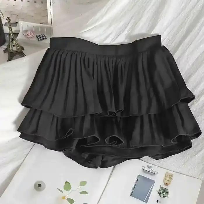 Jupe mini plissée noire style grunge avec short intégré à double ceinture