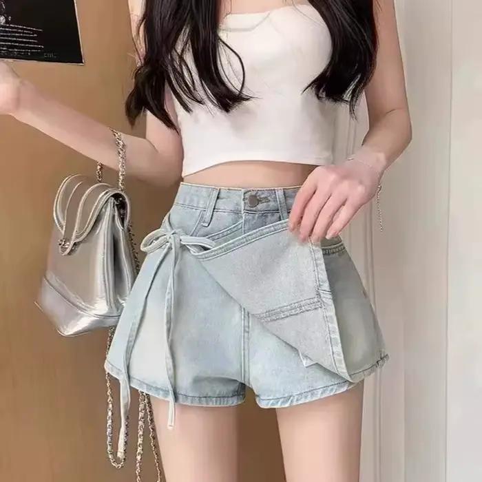 Mode noeud papillon a-ligne Denim jupes femmes coréen asymétrique fendu bleu jupe dames été nouveau basique taille haute