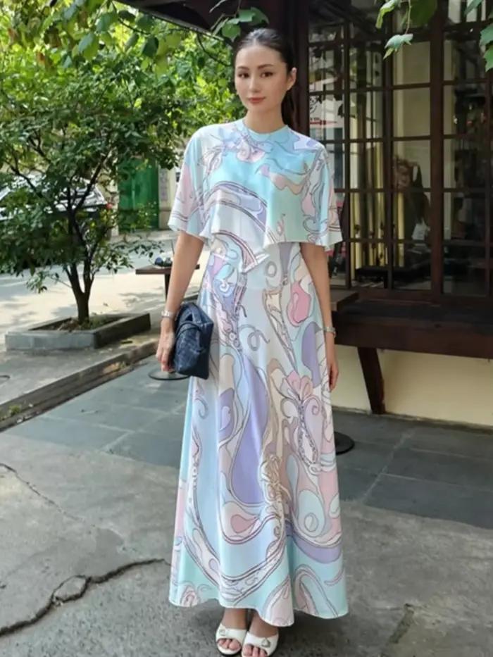 Ensemble jupe longue imprimée et haut élégant à col rond et ourlet asymétrique pour femme