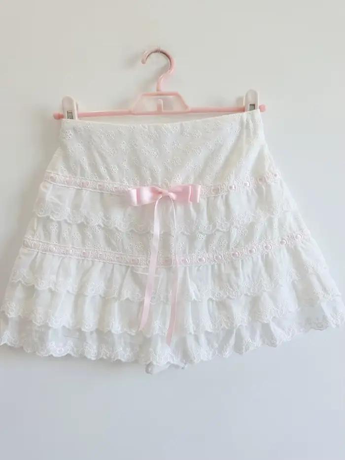 Jupes blanches pour filles adorables, décorées de fleurs brodées, avec un nœud, taille élastique, jupes courtes en coton à plusieurs couches, mignonnes, pour femmes