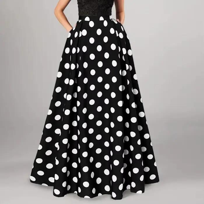 Jupe maxi a-ligne évasée imprimée à pois polyester pour femmes occasion spéciale trapèze vintage trapèze évasée silhouette trapèze évasée style rétro舒适版:穿上这款女士A字裙,你将体验到复古与现代的完美结合。无论是春夏季节,还是日常穿搭,它都能让你在各种场合中闪耀。宽松的A字剪裁搭配经典的波点图案,不仅彰显个性,更带来无与伦比的舒适感。适合婚礼、聚会、办公室或海滩度假等多种场景。选择这款复古风格的A字裙,让你在每个特殊时刻都成为焦点。