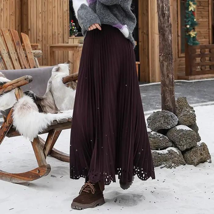 Femmes solide Vintage jupe plissée fleur creuse a-ligne Medi longue Maxi