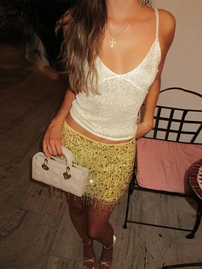 Sexy gland paillettes a-ligne Mini jupe courte femmes solide mince hanche paquet jupes 2025 printemps été dame fête plage vêtements d'extérieur nouveau