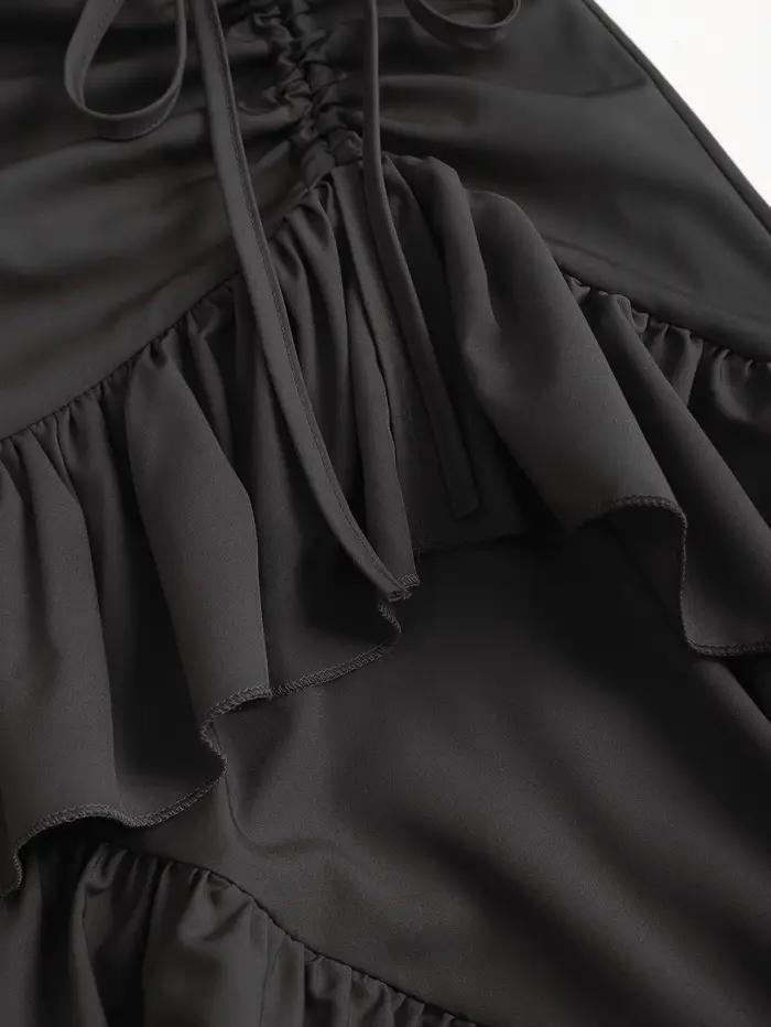 Jupe midi asymétrique noire à volants multicouches