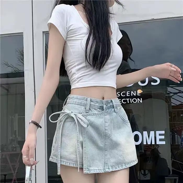Mode noeud papillon a-ligne Denim jupes femmes coréen asymétrique fendu bleu jupe dames été nouveau basique taille haute